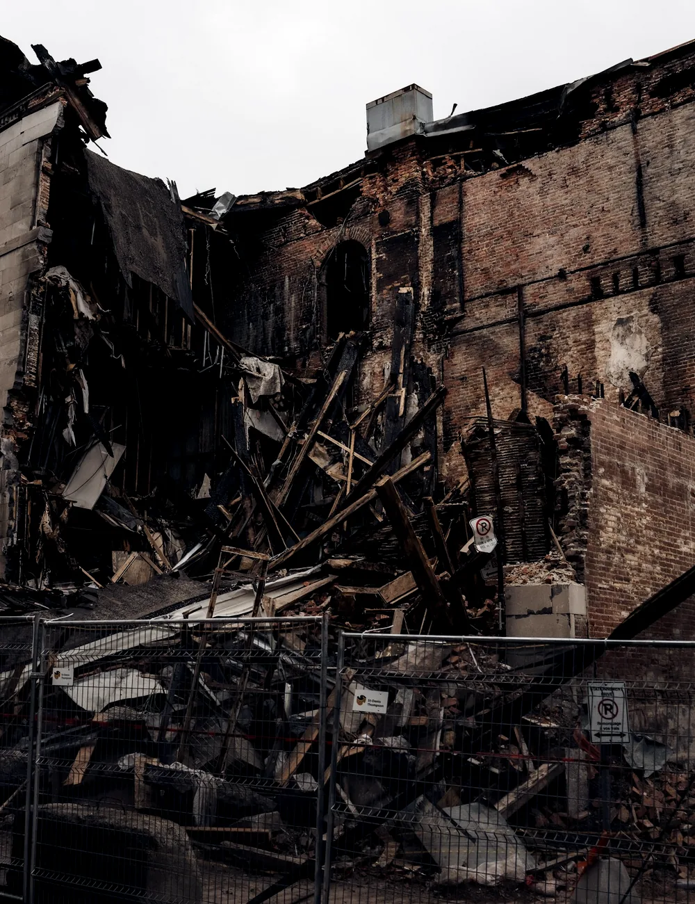Fire-damaged multi-storey building under assessment