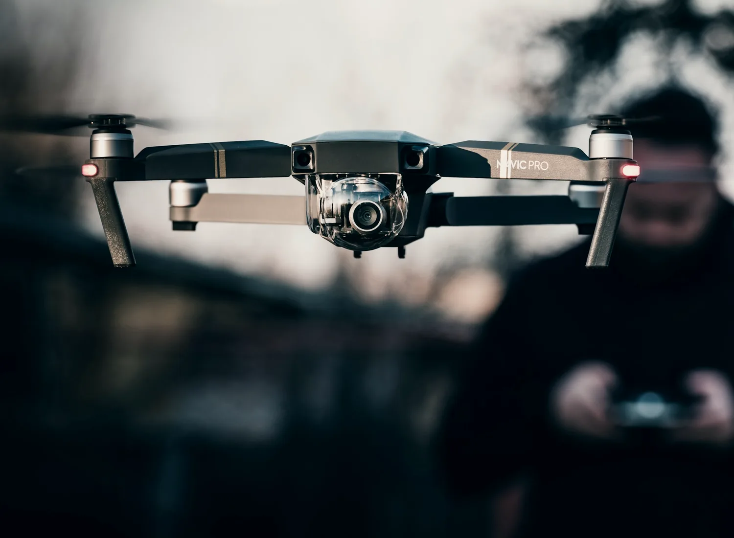 Survey drone hovering during a field inspection